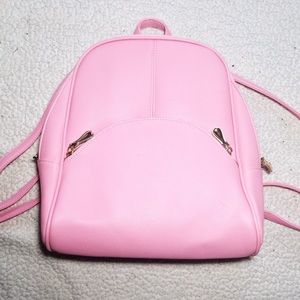 Pink small backpack with gold hardware